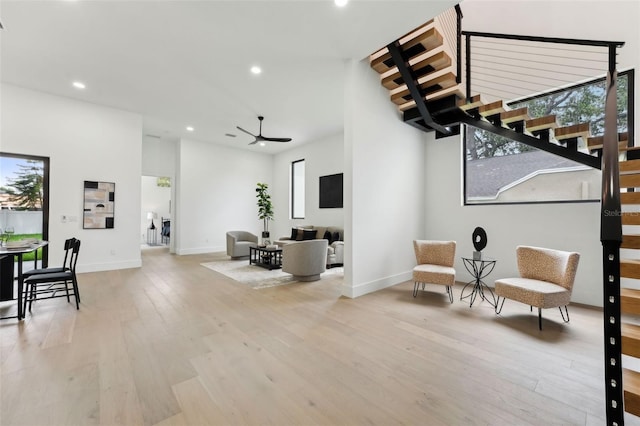 3817 W San Nicholas St, Tampa, FL 33629 - sitting room featuring recessed lighting, light wood-style floors, ceiling fan, baseboards, and stairway