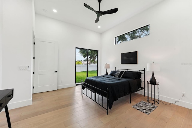 3817 W San Nicholas St, Tampa, FL 33629 - bedroom featuring access to outside, baseboards, light wood finished floors, recessed lighting, and a high ceiling