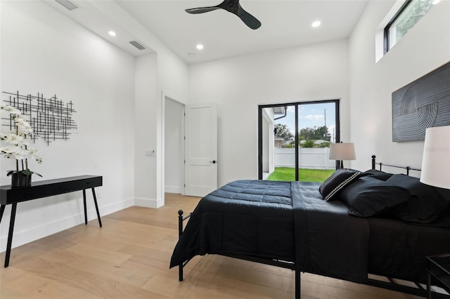 3817 W San Nicholas St, Tampa, FL 33629 - bedroom with a high ceiling, multiple windows, light wood-style flooring, recessed lighting, and access to outside