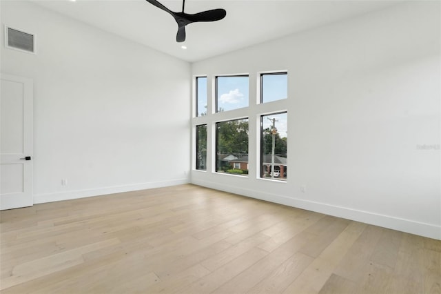 3817 W San Nicholas St, Tampa, FL 33629 - spare room featuring baseboards, ceiling fan, light wood-style flooring, high vaulted ceiling, and recessed lighting