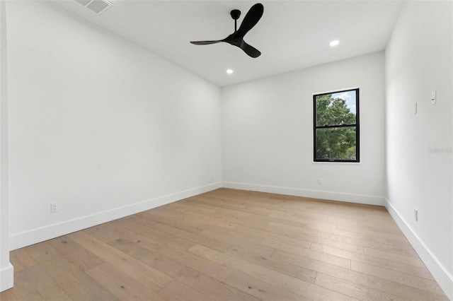3817 W San Nicholas St, Tampa, FL 33629 - empty room with a ceiling fan, light wood-style flooring, recessed lighting, and baseboards