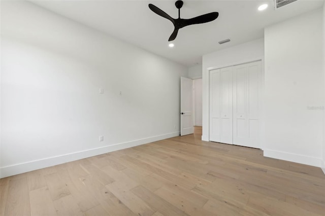 3817 W San Nicholas St, Tampa, FL 33629 - unfurnished bedroom with baseboards, light wood finished floors, recessed lighting, a closet, and a ceiling fan