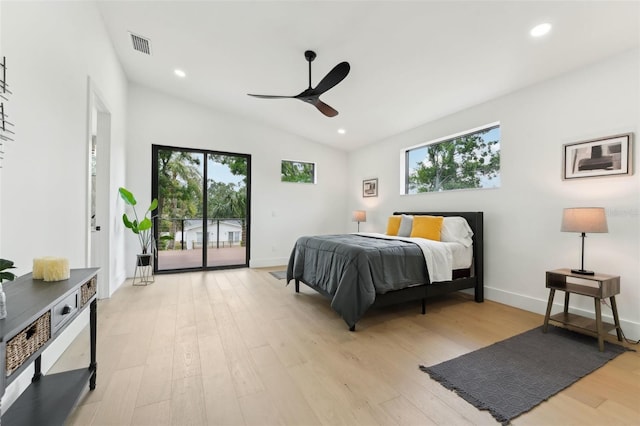3817 W San Nicholas St, Tampa, FL 33629 - bedroom with access to outside, multiple windows, lofted ceiling, light wood finished floors, and recessed lighting