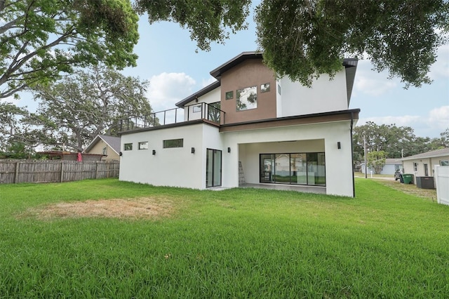 3817 W San Nicholas St, Tampa, FL 33629 - rear view of house with a balcony and stucco siding