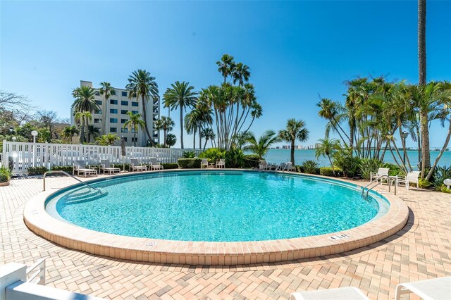 80 Rogers St Unit 6D, Clearwater, FL 33756 - community pool featuring fence and a water view