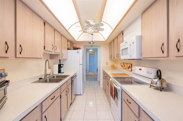 80 Rogers St Unit 6D, Clearwater, FL 33756 - kitchen with white appliances, a sink, light countertops, ceiling fan, and light brown cabinetry