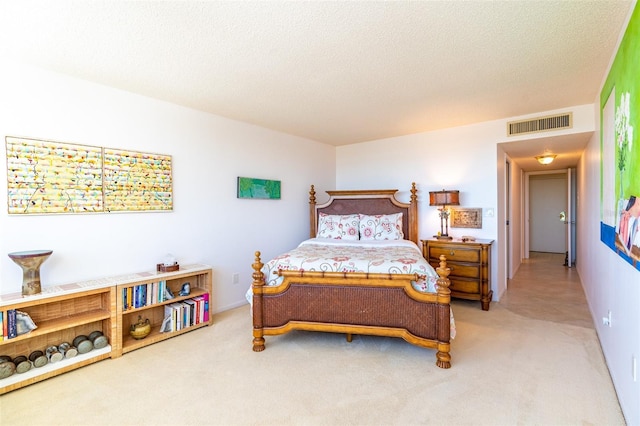 80 Rogers St Unit 6D, Clearwater, FL 33756 - bedroom with light colored carpet and a textured ceiling