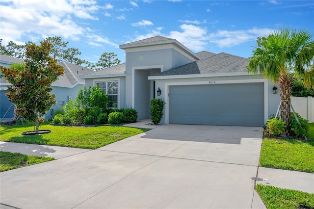 9059 Spruce Creek Cir, Riverview, FL 33578 - single story home with stucco siding, roof with shingles, a garage, and concrete driveway