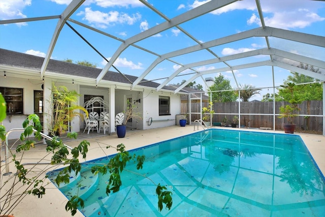 8737 Beaver Ln, Port Richey, FL 34668 - view of pool featuring a patio, fence, and a lanai
