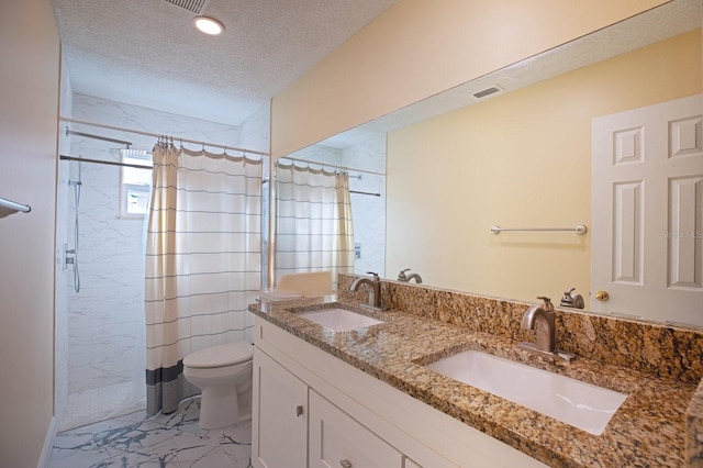 8737 Beaver Ln, Port Richey, FL 34668 - bathroom featuring marble look tiles, a textured ceiling, toilet, curtained shower, and double vanity