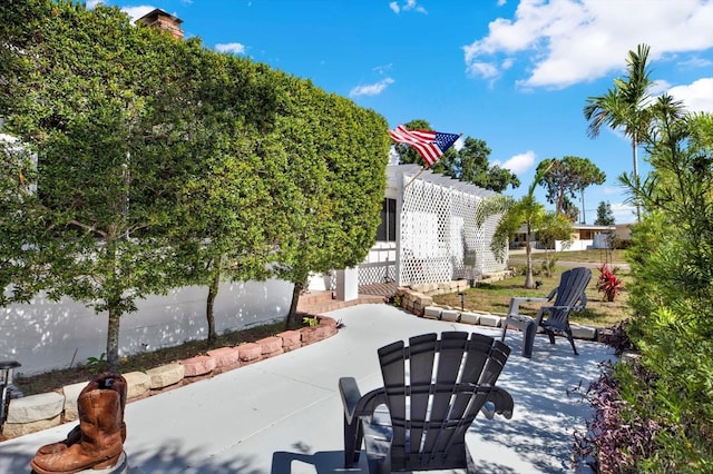 3501 63rd St N, Saint Petersburg, FL 33710 - view of home's community featuring a patio area and a pergola