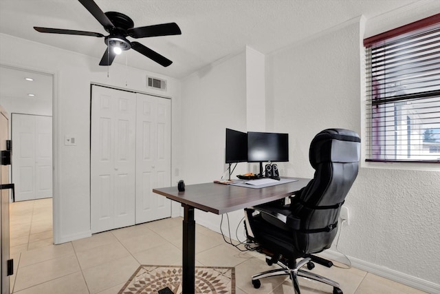 3501 63rd St N, Saint Petersburg, FL 33710 - office featuring a textured wall, crown molding, ceiling fan, light tile patterned flooring, and baseboards
