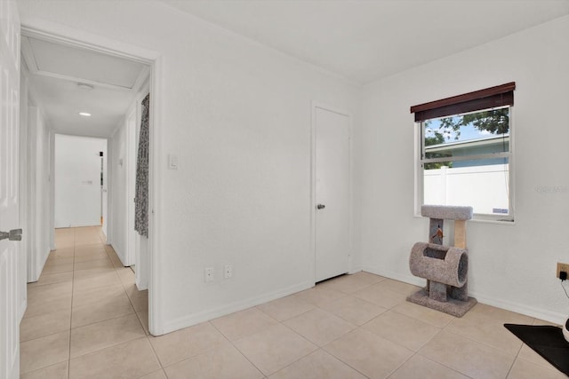 3501 63rd St N, Saint Petersburg, FL 33710 - spare room featuring light tile patterned flooring and baseboards