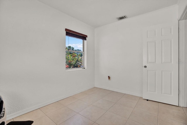 3501 63rd St N, Saint Petersburg, FL 33710 - empty room with light tile patterned floors and baseboards