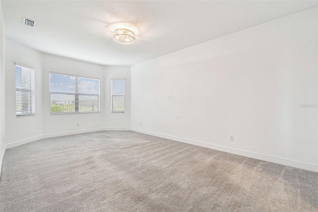 12710 Wheatgrass Ct, Parrish, FL 34219 - unfurnished room featuring carpet flooring and baseboards