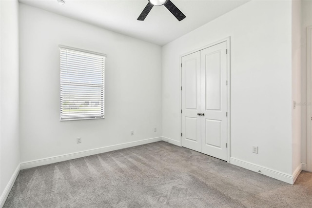 12710 Wheatgrass Ct, Parrish, FL 34219 - unfurnished bedroom with carpet flooring, baseboards, and a closet