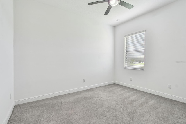 12710 Wheatgrass Ct, Parrish, FL 34219 - empty room with carpet floors, baseboards, and ceiling fan
