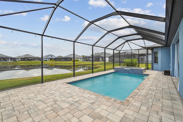 12710 Wheatgrass Ct, Parrish, FL 34219 - view of swimming pool featuring a patio area, a residential view, a water view, a lawn, and a pool with connected hot tub