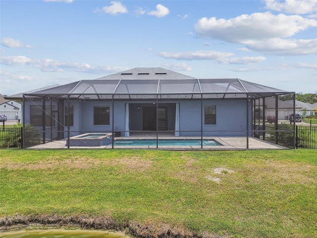 12710 Wheatgrass Ct, Parrish, FL 34219 - rear view of house with a patio, a pool with connected hot tub, and a lanai