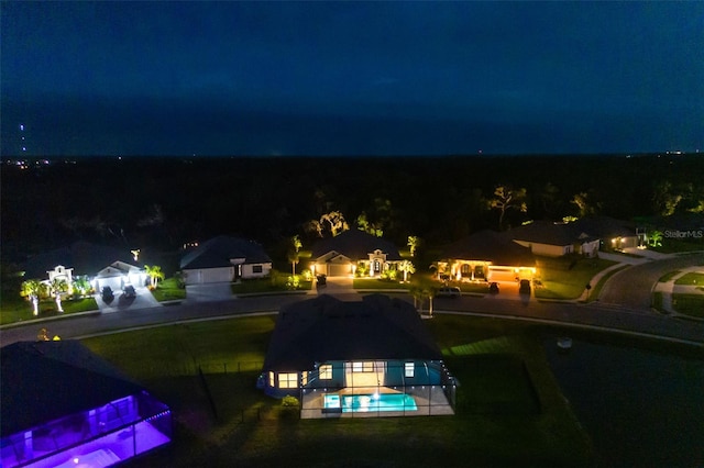 12710 Wheatgrass Ct, Parrish, FL 34219 - aerial view at twilight of view of pool area