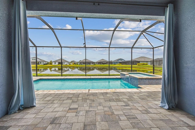 12710 Wheatgrass Ct, Parrish, FL 34219 - view of swimming pool with a residential view, a water view, a patio area, and a lanai