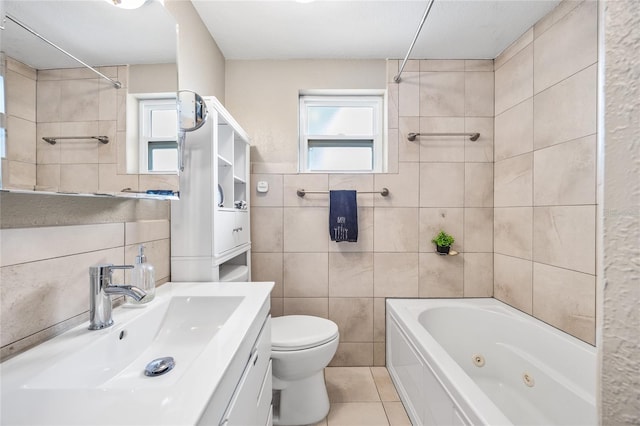 full bath featuring tile walls, tile patterned floors, toilet, a combined bath / shower with jetted tub, and vanity