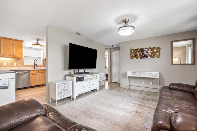 living area featuring light wood-style flooring