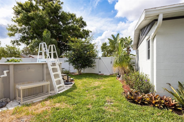 view of yard with a gate