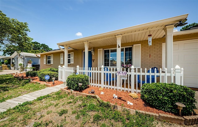 6111 2nd Ave, New Port Richey, FL 34653 - ranch-style home featuring a porch, brick siding, and an attached garage