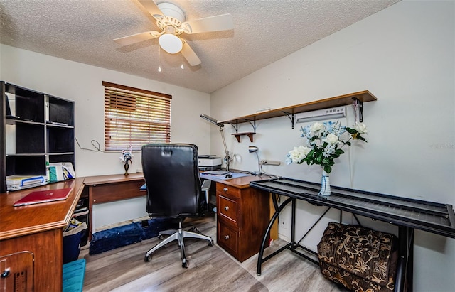 6111 2nd Ave, New Port Richey, FL 34653 - home office featuring light wood-style floors, a textured ceiling, and a ceiling fan