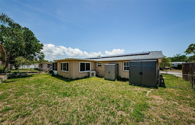 6111 2nd Ave, New Port Richey, FL 34653 - back of house with solar panels and stucco siding