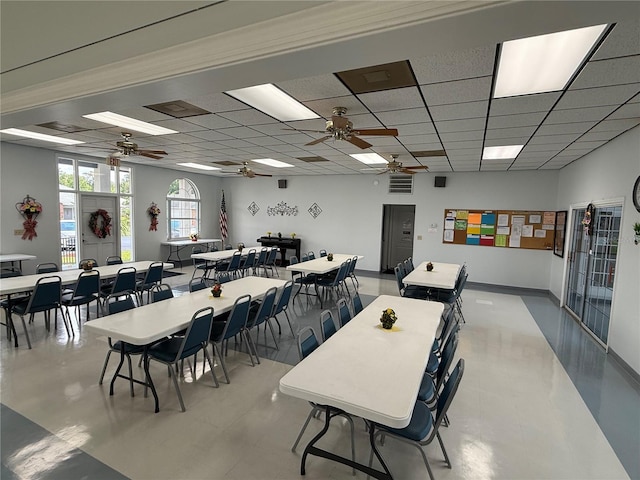 37401 Teaberry Loop, Zephyrhills, FL 33542 - dining room featuring a paneled ceiling and ceiling fan