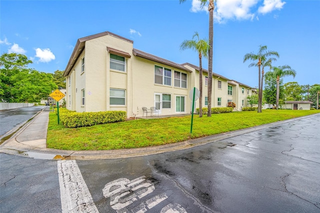 1100 E Bay Dr Unit 60, Largo, FL 33770 - view of building exterior with a residential view