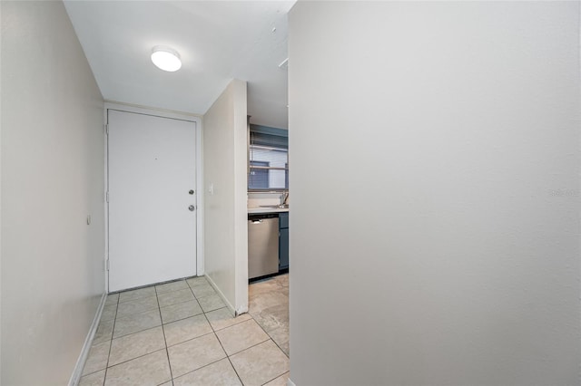 1100 E Bay Dr Unit 60, Largo, FL 33770 - hall with light tile patterned flooring and baseboards