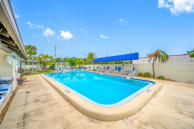 1100 E Bay Dr Unit 60, Largo, FL 33770 - community pool featuring fence and a patio