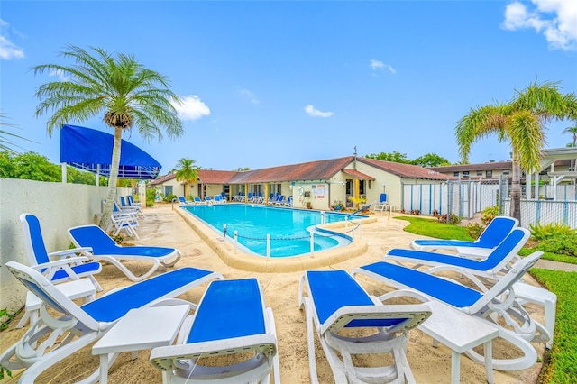 1100 E Bay Dr Unit 60, Largo, FL 33770 - community pool with fence and a patio