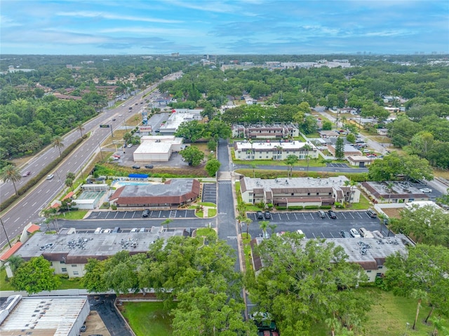 1100 E Bay Dr Unit 60, Largo, FL 33770 - aerial view of property's location with a tree filled landscape