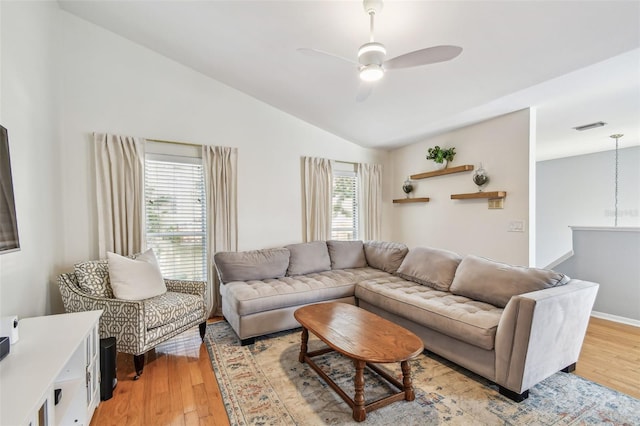 3205 W De Leon St Unit F, Tampa, FL 33609 - living area with a ceiling fan, light wood finished floors, and vaulted ceiling