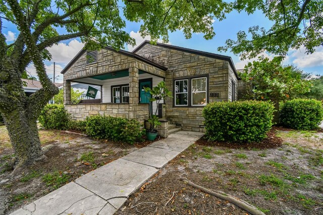 233 24th St N, Saint Petersburg, FL 33713 - view of front of home featuring stone siding
