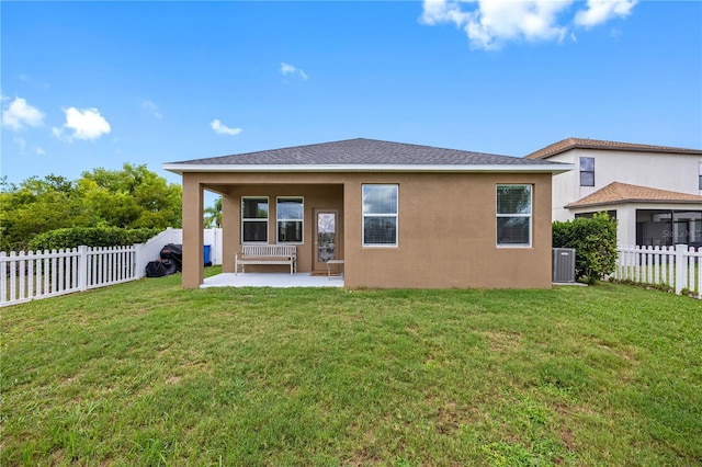 back of property featuring a patio, cooling unit, and stucco siding