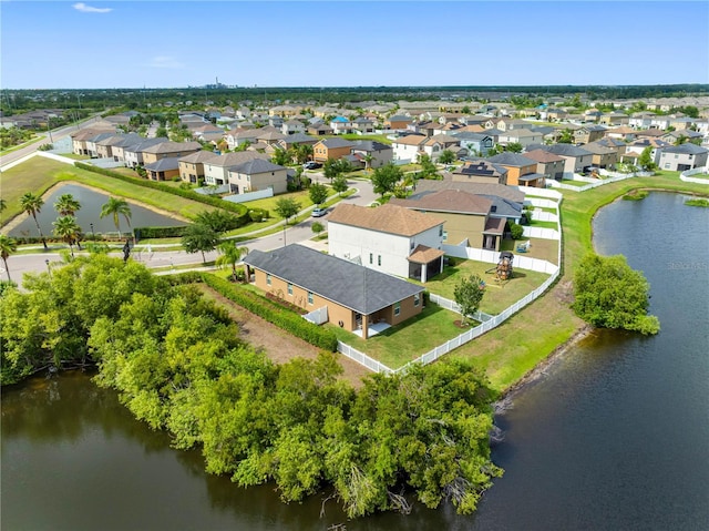 aerial view of residential area with a nearby body of water