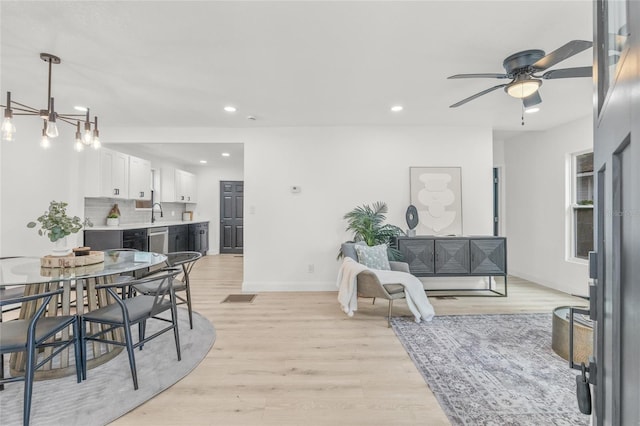 7 Hamilton Heath Dr, Tampa, FL 33604 - dining room with recessed lighting, light wood finished floors, baseboards, and a ceiling fan