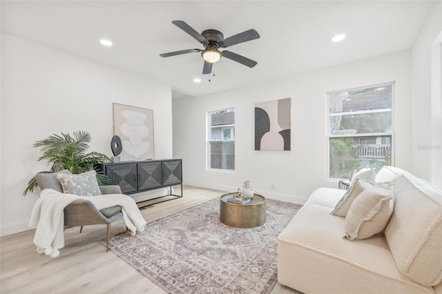 7 Hamilton Heath Dr, Tampa, FL 33604 - living room with wood finished floors, a ceiling fan, recessed lighting, and baseboards