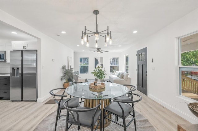 7 Hamilton Heath Dr, Tampa, FL 33604 - dining area featuring a ceiling fan, light wood-style flooring, recessed lighting, and baseboards