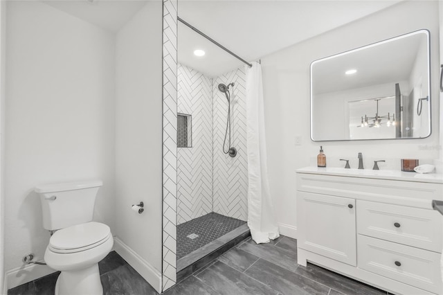 7 Hamilton Heath Dr, Tampa, FL 33604 - full bathroom featuring baseboards, toilet, a stall shower, recessed lighting, and vanity