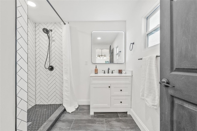7 Hamilton Heath Dr, Tampa, FL 33604 - full bathroom with a stall shower, baseboards, and vanity