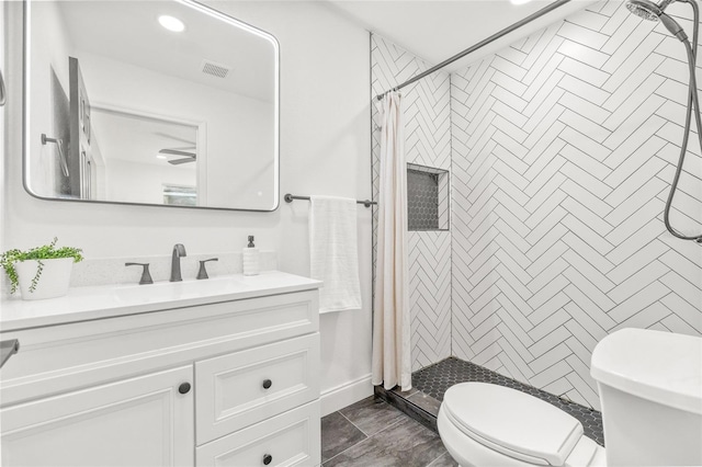 7 Hamilton Heath Dr, Tampa, FL 33604 - full bathroom with toilet, a shower stall, vanity, and recessed lighting