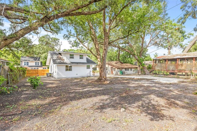 7 Hamilton Heath Dr, Tampa, FL 33604 - back of house with fence and stucco siding