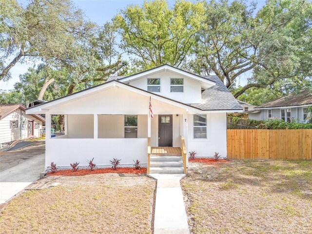 7 Hamilton Heath Dr, Tampa, FL 33604 - bungalow with fence, roof with shingles, and stucco siding