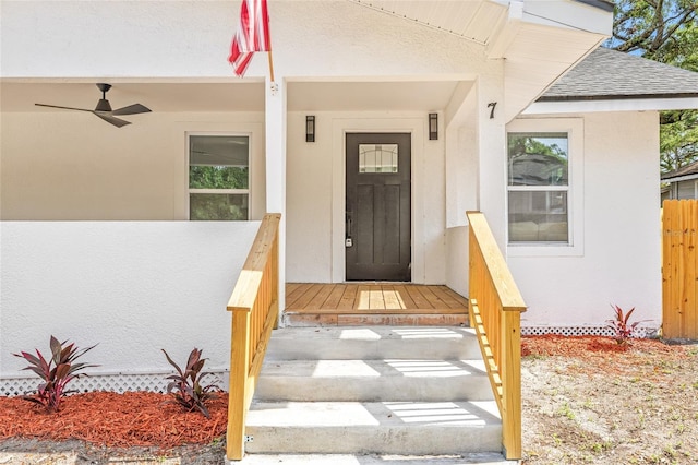 7 Hamilton Heath Dr, Tampa, FL 33604 - entrance to property with stucco siding, a shingled roof, and fence